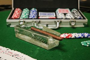 cigars and cards on table
